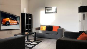 Appartement | Coin séjour | Télévision à écran plat