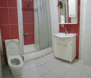 Apartment, 2 Bedrooms | Bathroom | Deep soaking tub, free toiletries, hair dryer, slippers