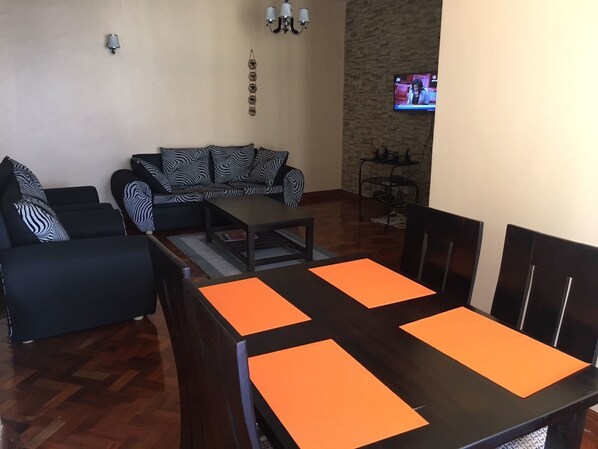 Apartment, 3 Bedrooms | Living area