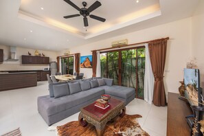 Comfort Villa, 3 Bedrooms | Living area | 30-inch flat-screen TV with cable channels, TV, DVD player - Villa Iorangi (Rawai)