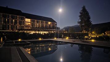 Seasonal outdoor pool, open 8:00 AM to 8:00 PM, pool umbrellas