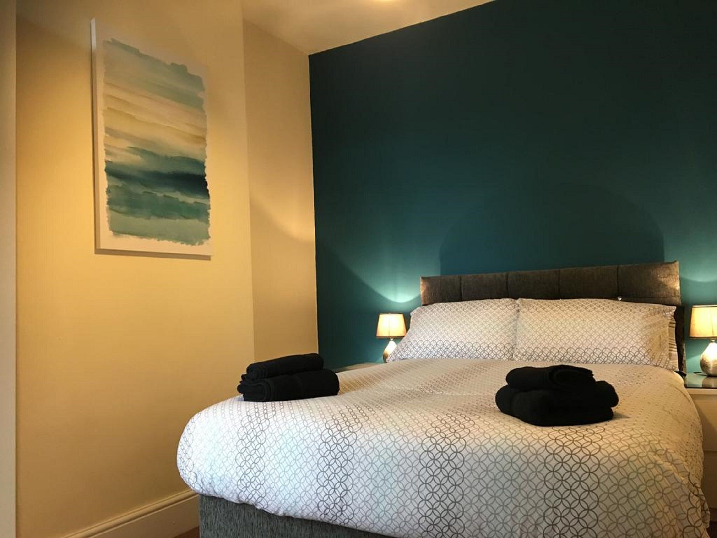 Habitación | Tabla de planchar con plancha, wifi gratis y ropa de cama 