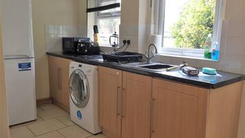 Royle House | Private kitchen | Fridge, microwave, coffee/tea maker, electric kettle