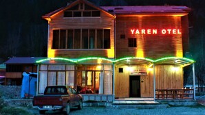 A two-story wooden building with a sign reading "Yaren Hotel". - Yaren Otel (Çaykara)