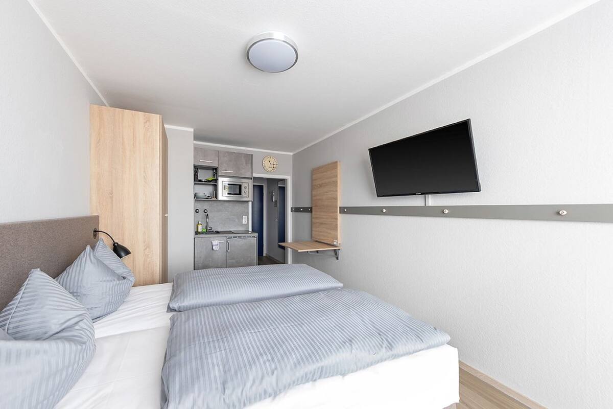 In-room safe, desk, laptop workspace, blackout curtains