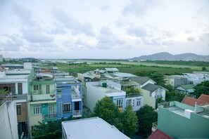 Basic Quadruple Room, 1 Bedroom | Terrace/patio - Hoang Thuy Sinh Hotel (Da Nang)