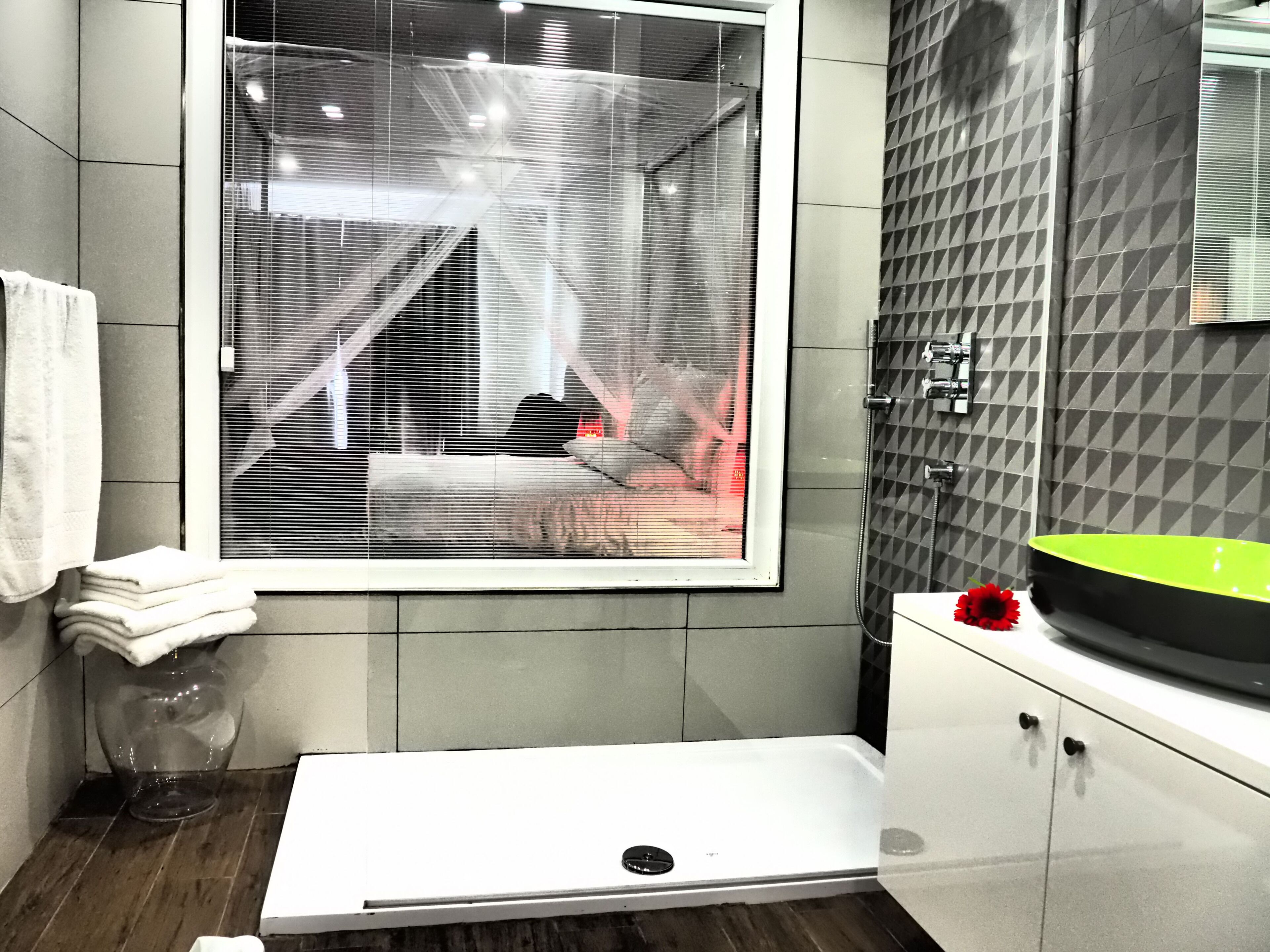 room (superior suite) | bathroom | deep-soaking bathtub, rainfall showerhead, free toiletries, hair dryer