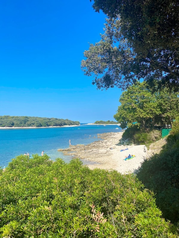 On the beach, beach towels