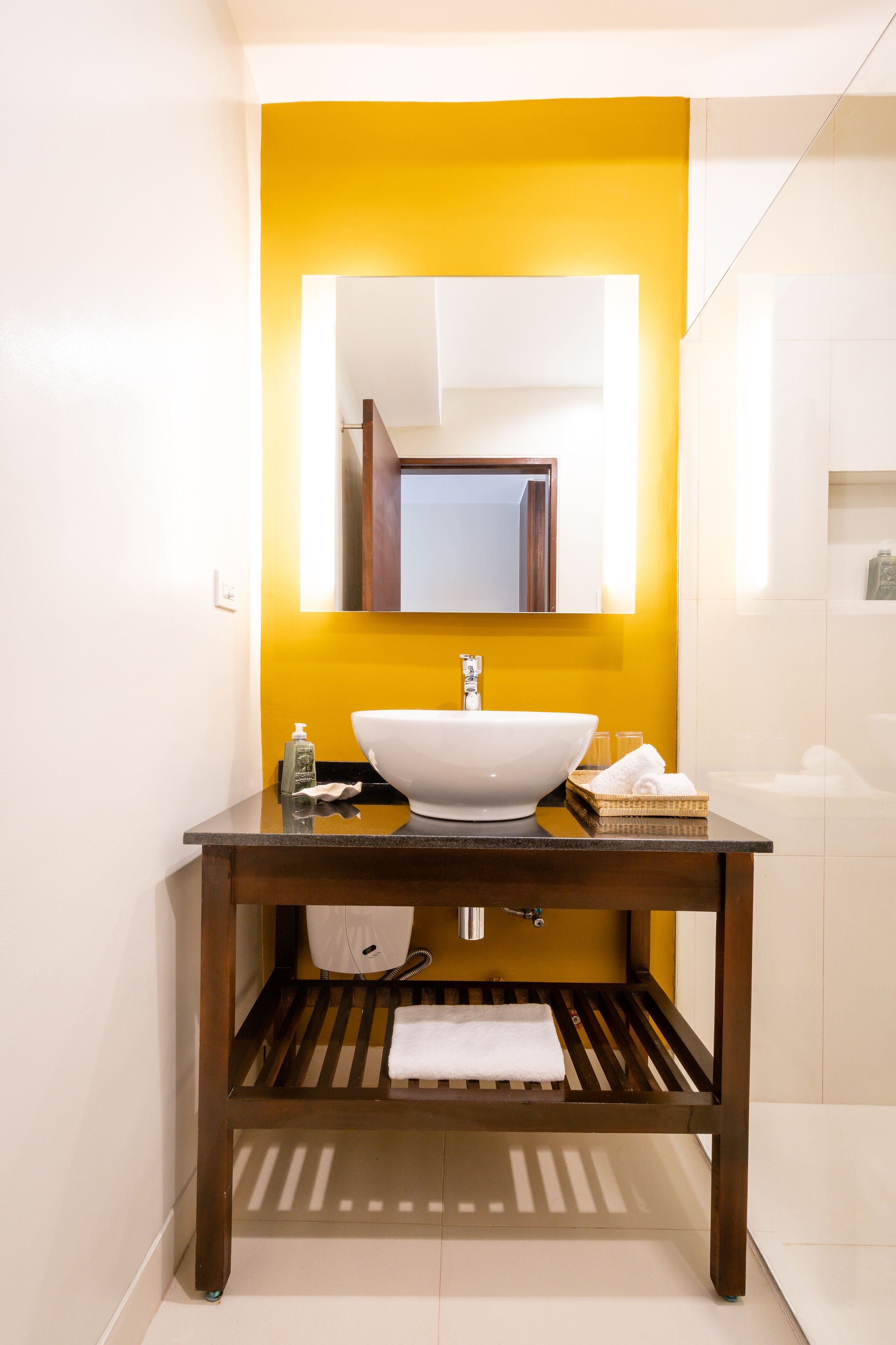 deluxe room | bathroom | shower, free toiletries, hair dryer, bathrobes