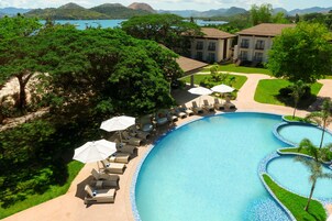 Outdoor pool, free cabanas, pool umbrellas