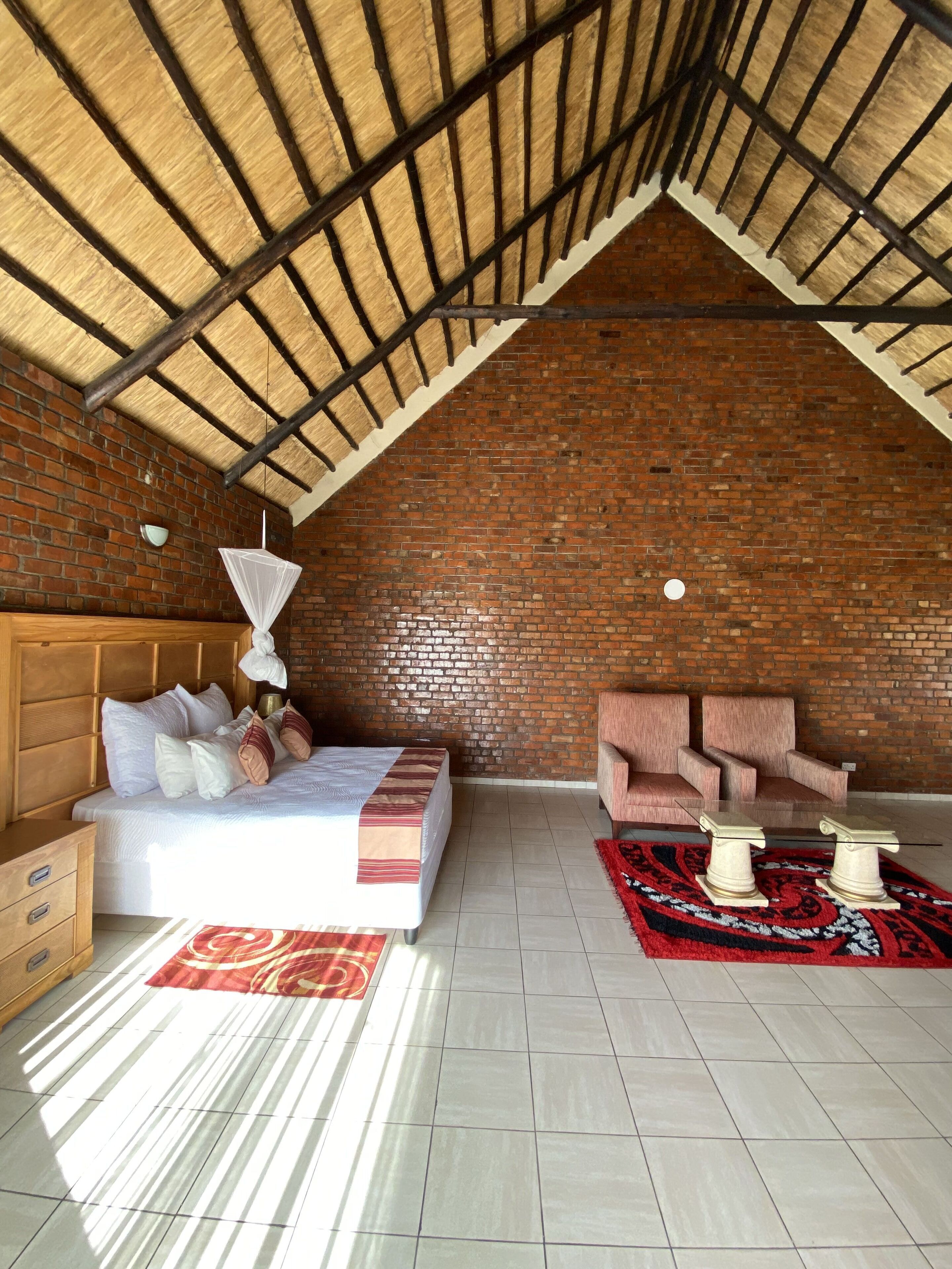 Habitación ejecutiva | Muebles diferentes, wifi gratis y ropa de cama 