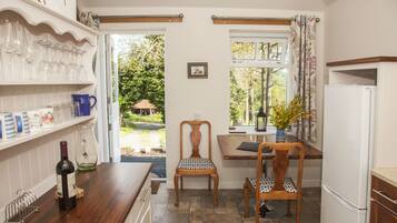 Honeymoon Cottage, 1 Bedroom | Private kitchen | Full-size fridge, microwave, oven, stovetop