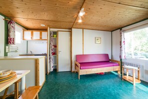 Chalet | Living area - Camping Domaine Des MATHEVIES (Sainte-Nathalene)