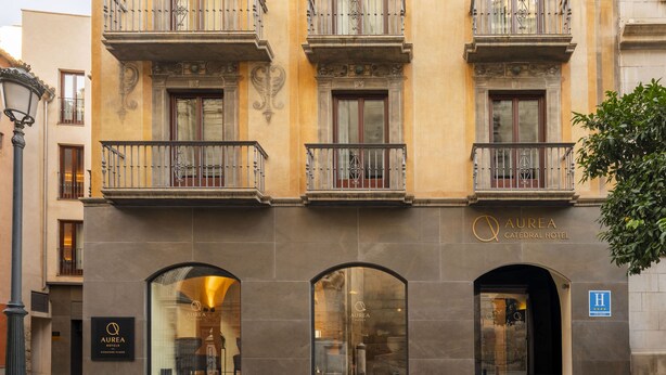 A hotel facade with balconies, large windows, and a sign for "Aurea Cathedral Hotel". - Áurea Catedral by Eurostars Hotel Company (Granada)