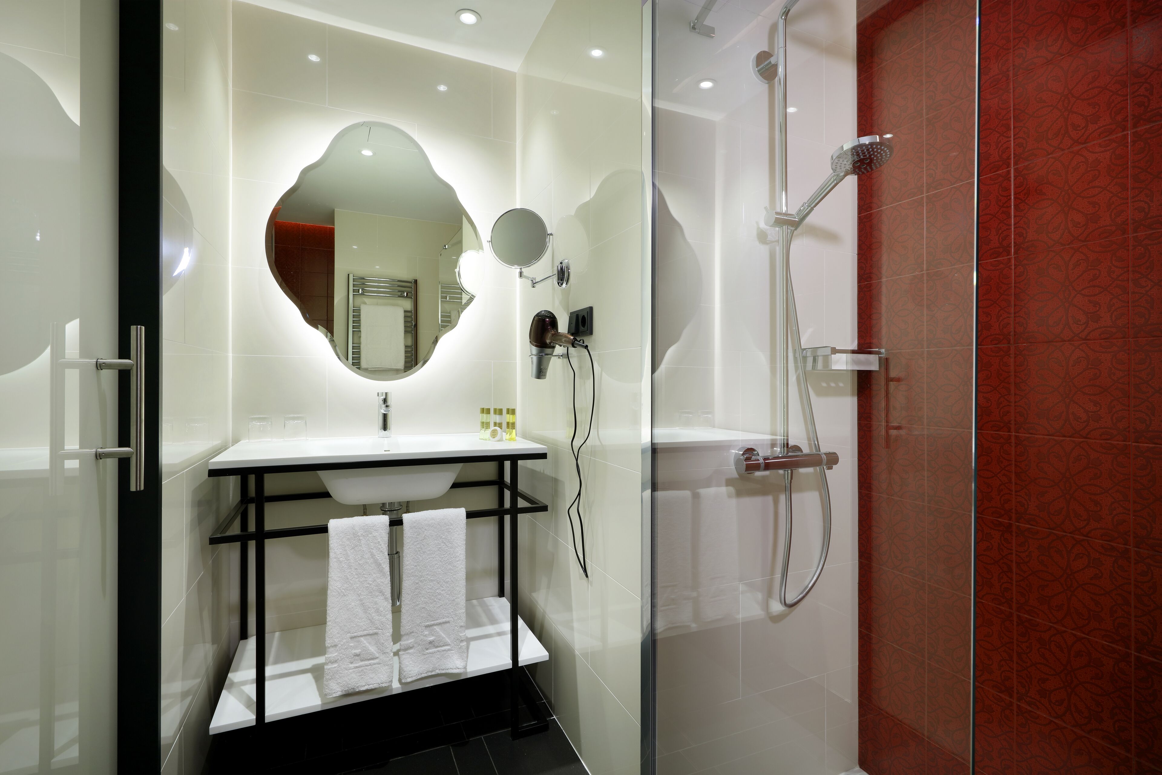 eco-friendly toiletries, hair dryer, towels