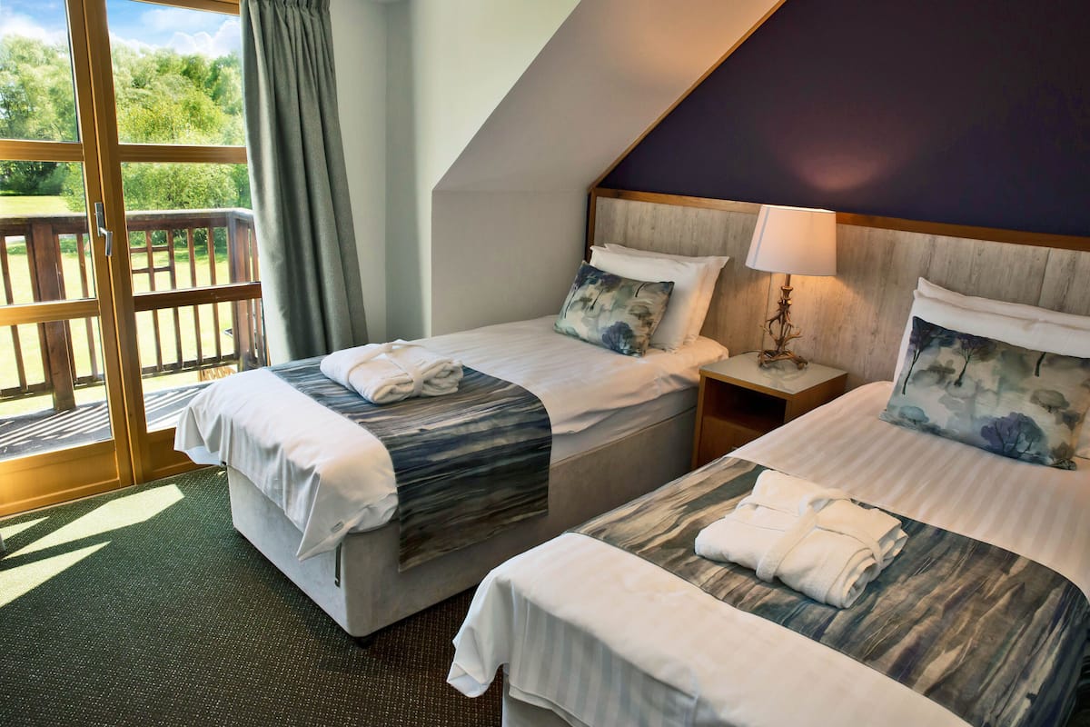 Premium bedding, desk, blackout curtains, soundproofing