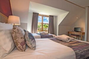 Premium bedding, desk, blackout curtains, soundproofing