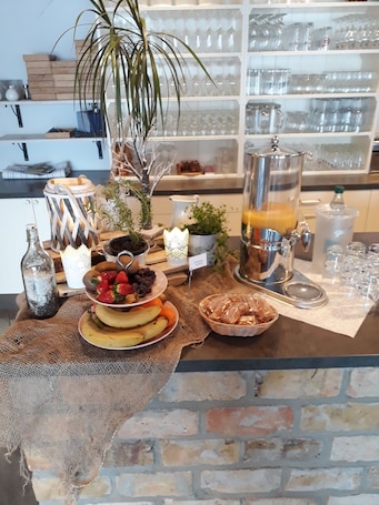 Desayuno continental diario (EUR 12.50 por persona)