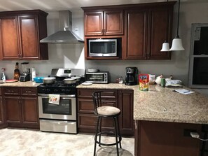 Room, 1 Queen Bed | Private kitchen