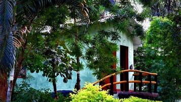 Machan Room | Down comforters, pillowtop beds, in-room safe, individually decorated