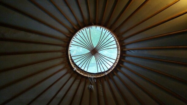 A circular skylight with radial wooden slats. - Beech Hill B&B (Northwich)