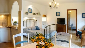 Apartment (2 Adults + 2 Children) | Living area | Flat-screen TV