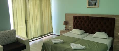 Desk, blackout curtains, rollaway beds, bed sheets