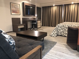 Deluxe Suite, 1 King Bed | Egyptian cotton sheets, premium bedding, down comforters, in-room safe