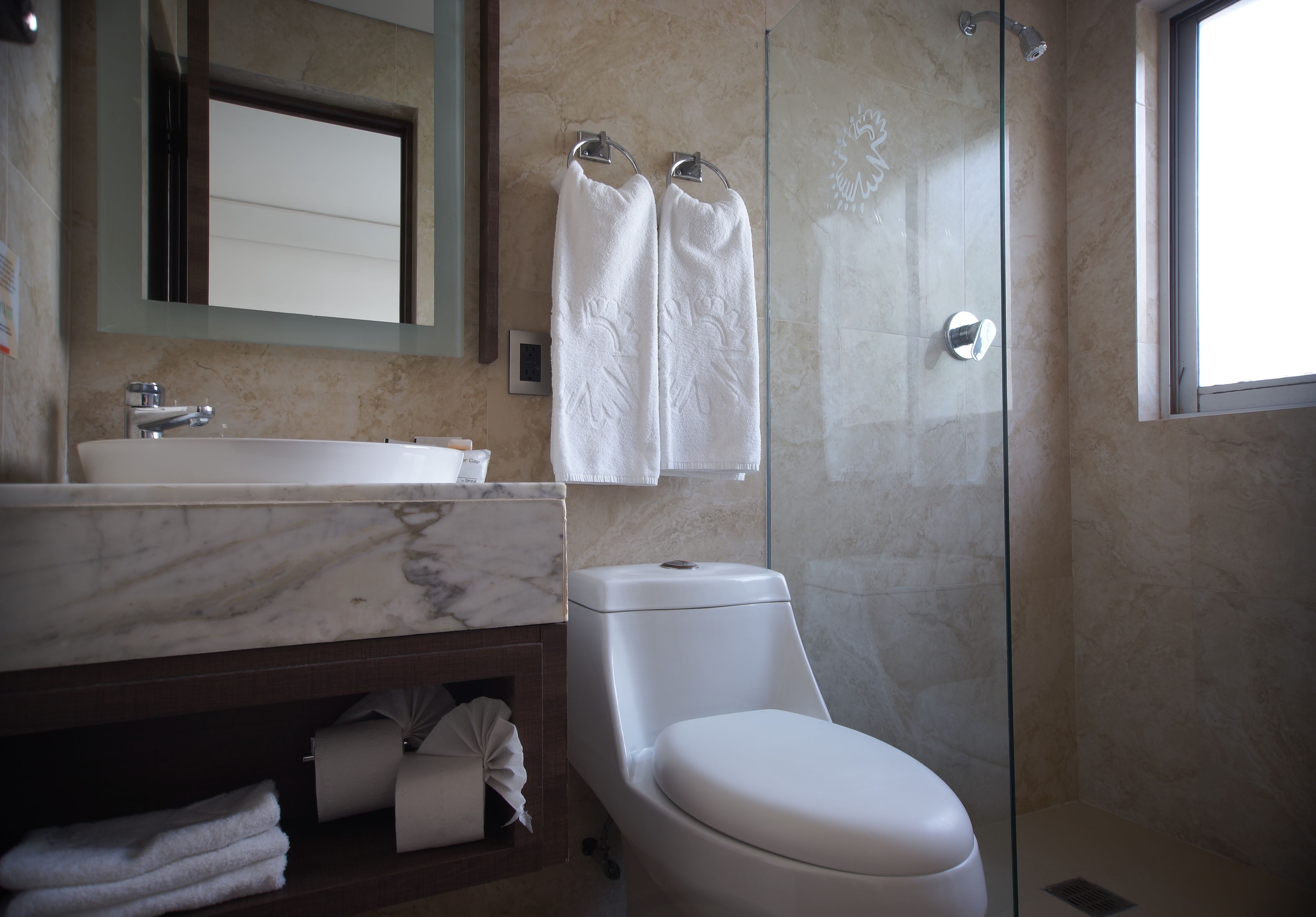 economy room | bathroom | shower, rainfall showerhead, designer toiletries, towels