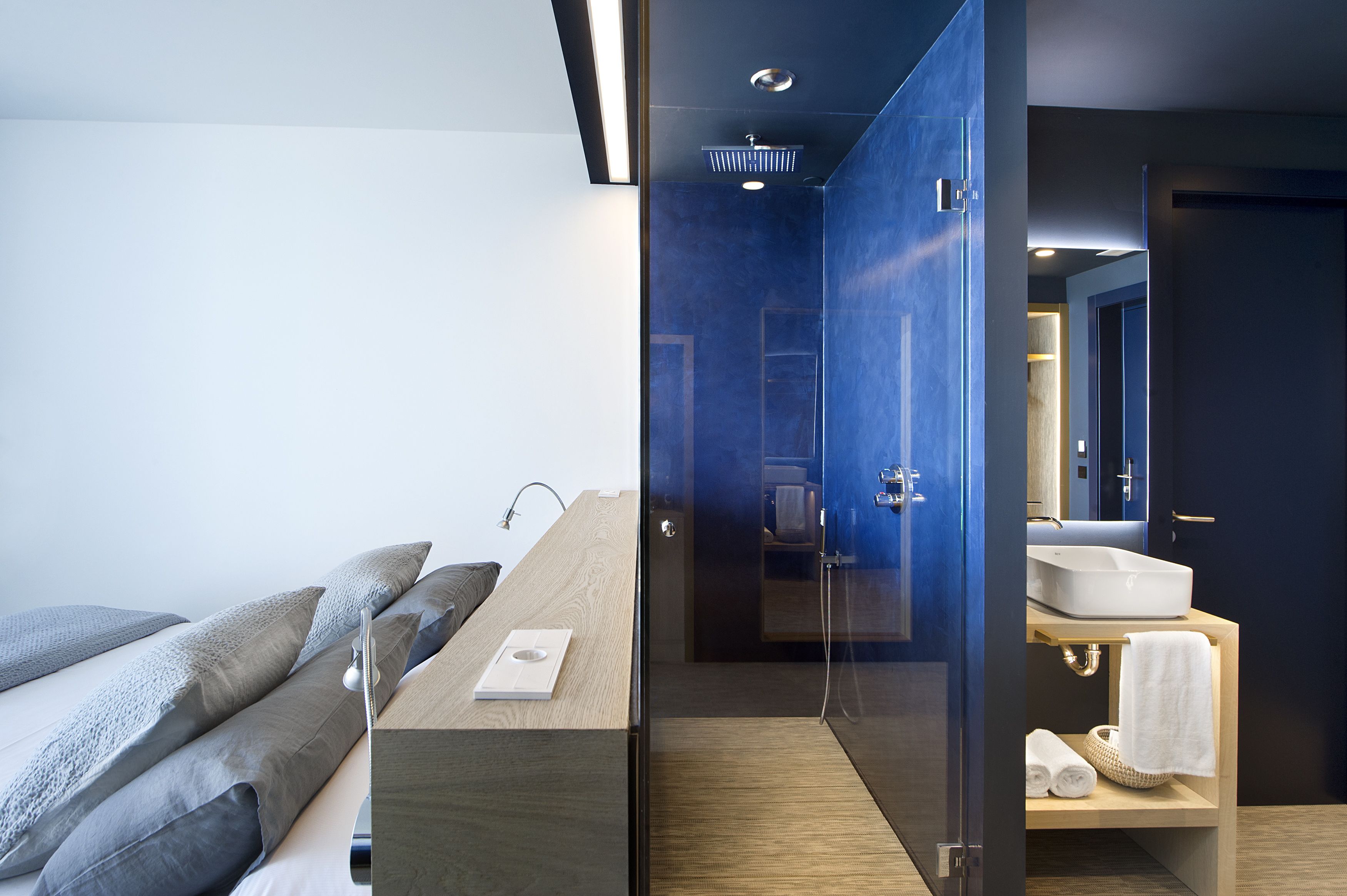 shower, designer toiletries, towels, soap