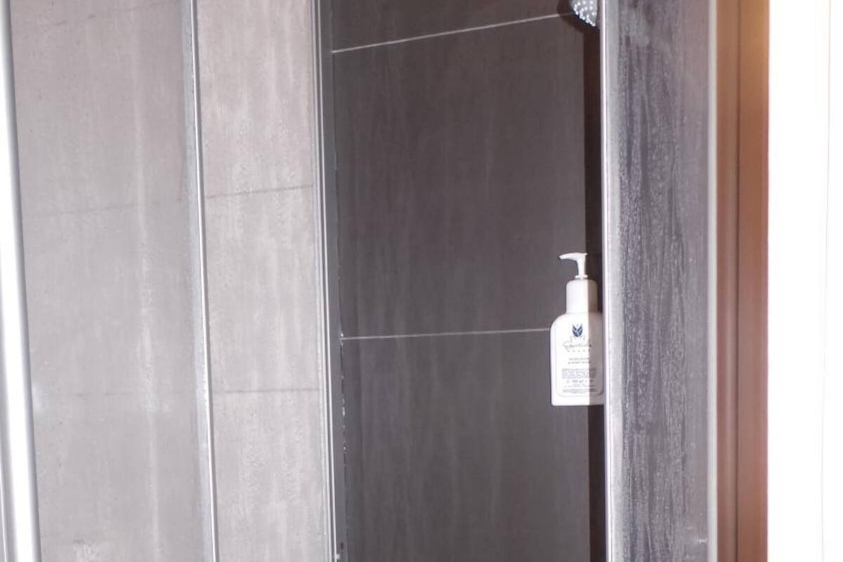 comfort single room | bathroom | shower, free toiletries, hair dryer, towels