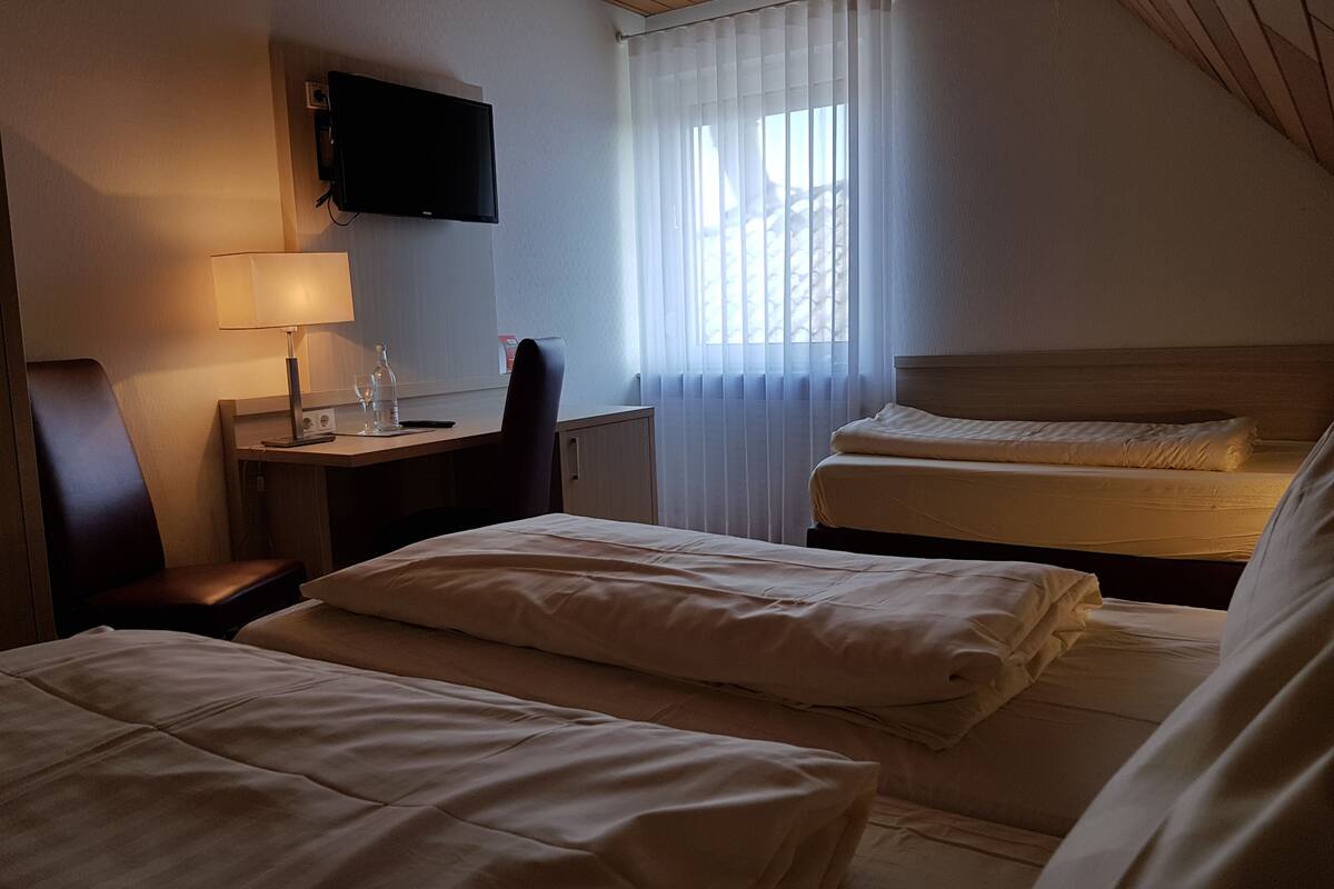 comfort triple room | in-room safe, desk, cots/infant beds, free wifi