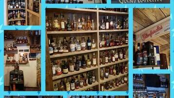 A liquor store with shelves of various bottles.