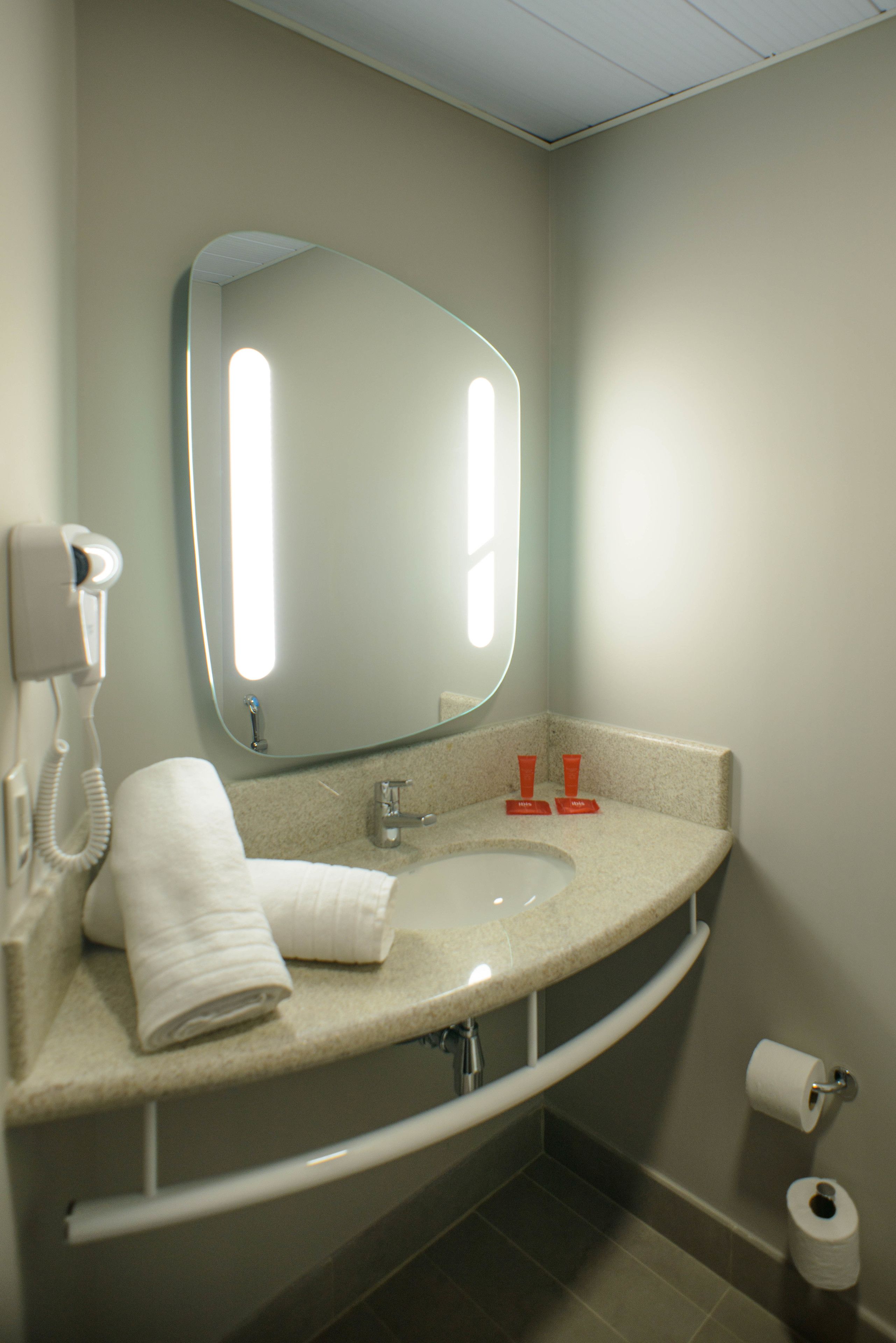 shower, eco-friendly toiletries, hair dryer, towels