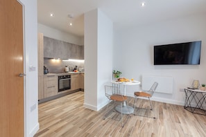 Apartament superior | Zona de menjador de l'habitació