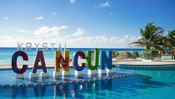 Outdoor pool, pool umbrellas, sun loungers