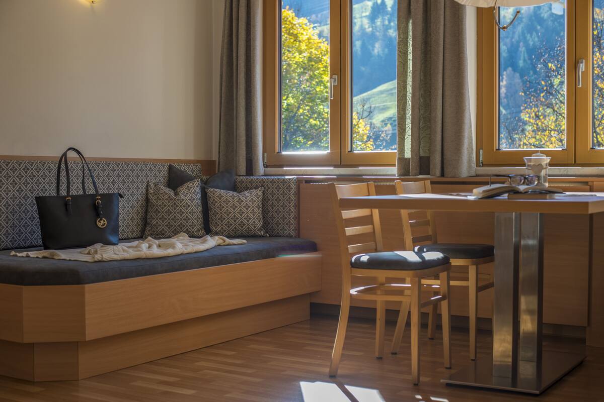Apartment (Gasteinertalblick) | Living area | Flat-screen TV