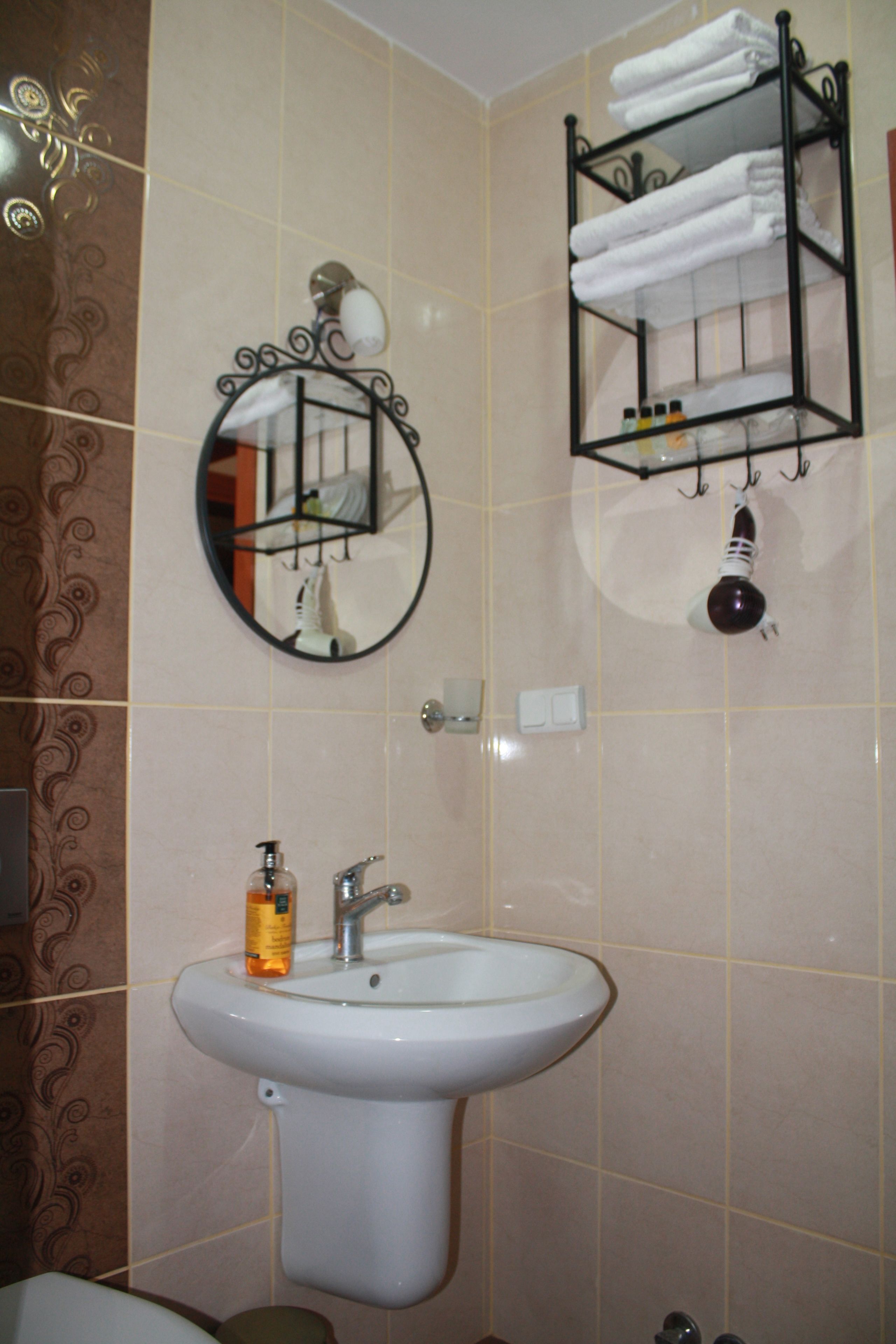 shower, free toiletries, hair dryer, slippers