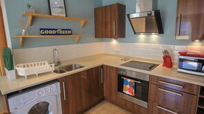 Fridge, microwave, oven, highchair - Cobourg House 4 (Tenby)