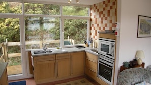 Microwave, oven, cookware/dishes/utensils
