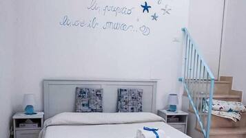 Quarto quádruplo conforto, 1 quarto, suíte, na torre | Roupas de cama premium, frigobar (abastecido com itens grátis)