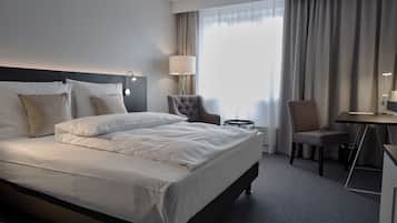 Camera singola, 1 letto queen | Minibar, una scrivania, tende oscuranti, Wi-Fi gratuito