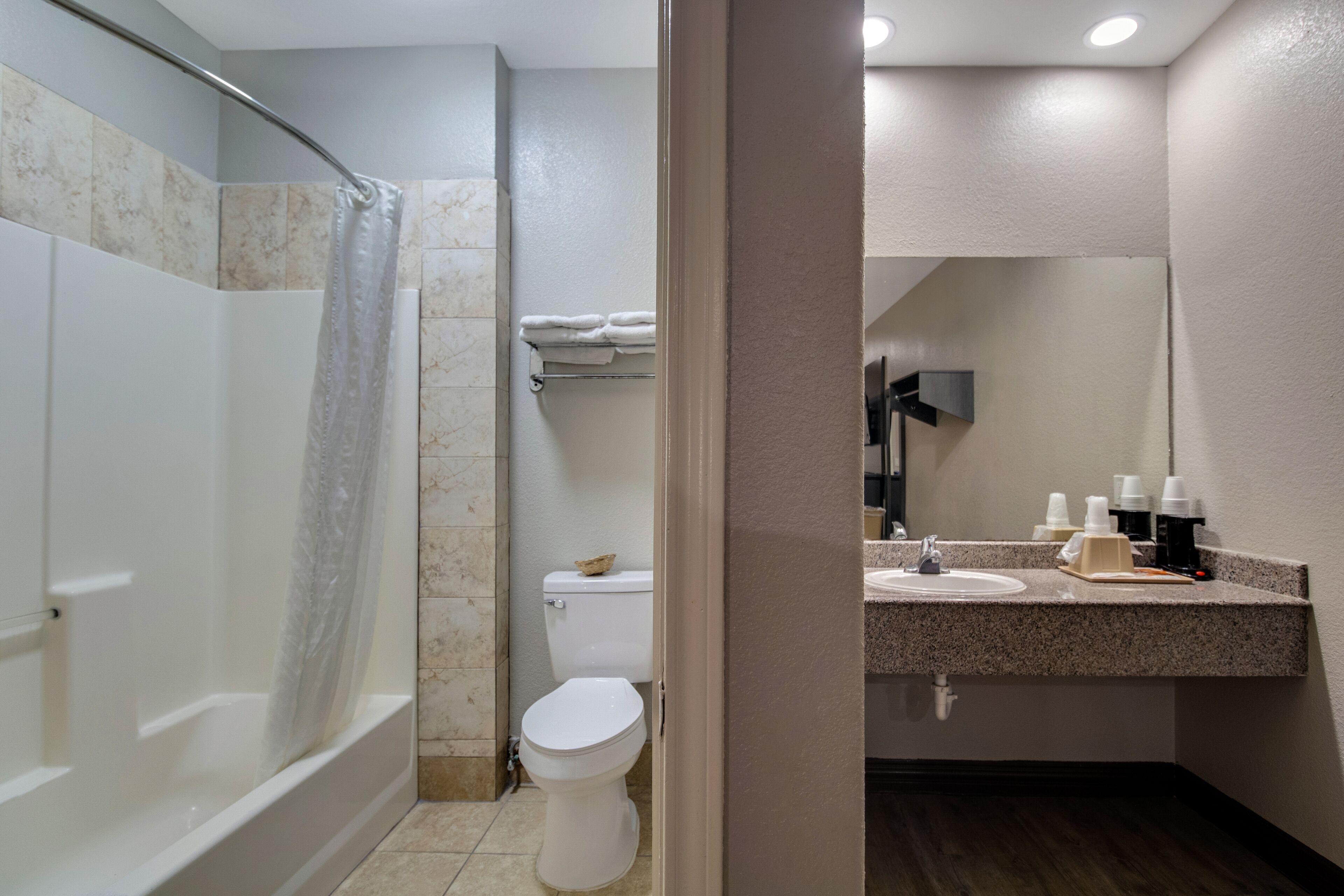 Room, 2 Queen Beds, Smoking | Bathroom | Deep soaking tub, free toiletries, towels