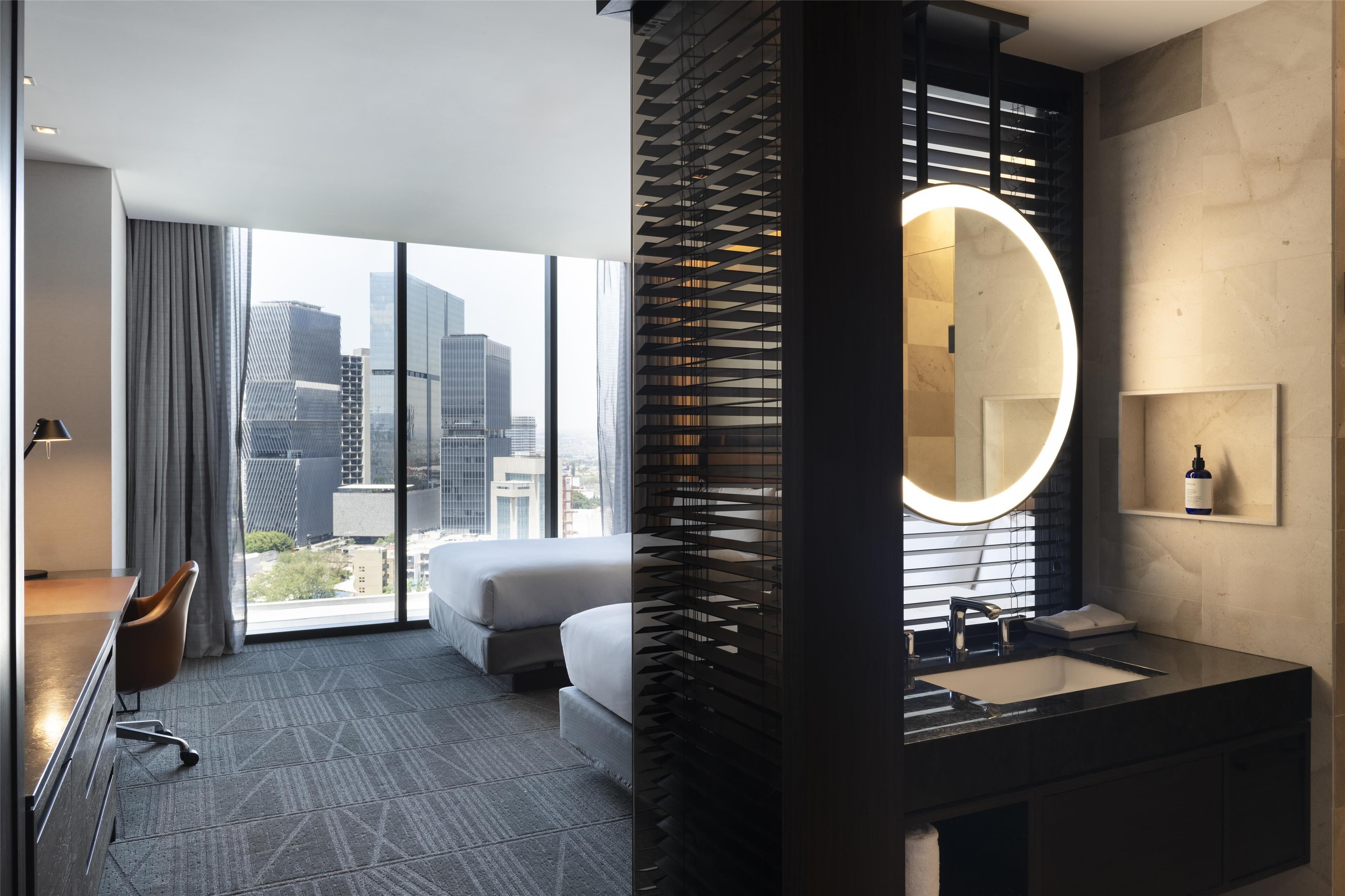 room, 2 queen beds, city view | bathroom | shower, rainfall showerhead, free toiletries, hair dryer