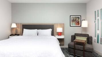 Desk, laptop workspace, iron/ironing board, free cribs/infant beds