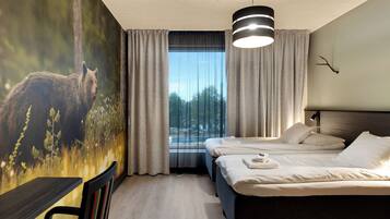 Superior Twin kamer | Een minibar, een bureau, een laptopwerkplek, verduisterende gordijnen