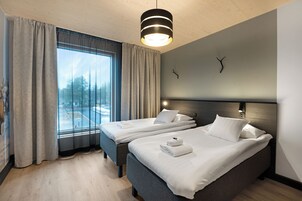 Superior Twin Room | Minibar, desk, laptop workspace, blackout drapes