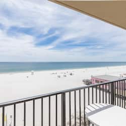 Enjoy stunning views of the beach from this balcony.
