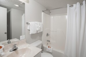 Studio Suite, 1 Bedroom | Bathroom | Hair dryer, towels