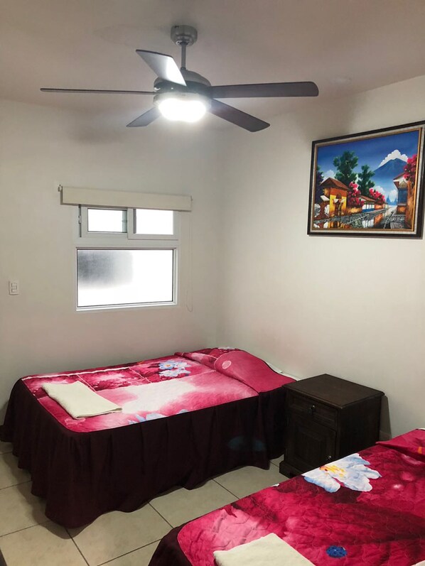 Basic Quadruple Room, 2 Double Beds, Private Bathroom | Desk, free WiFi, bed sheets